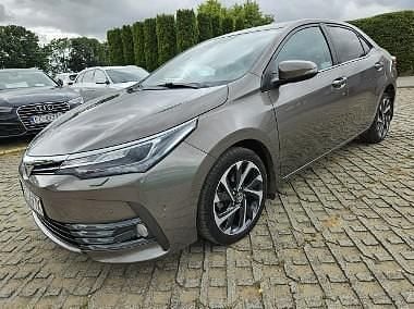 Brązowy (metalik, perła) Używany 2018 Toyota Corolla Sedan/Limuzyna | 62 500 zł (Dobra cena) - Obraz 1/4
