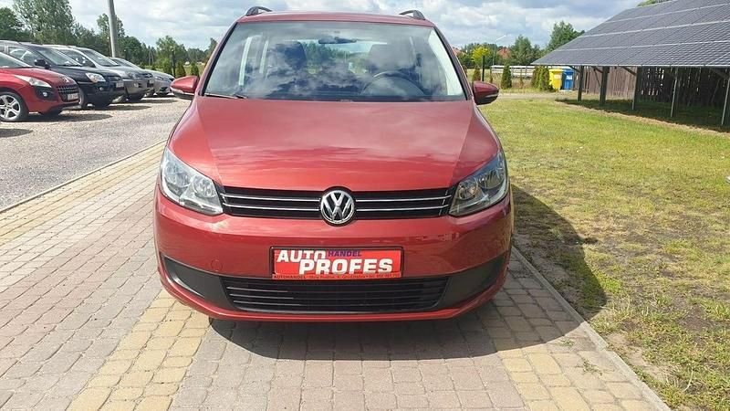 Bordowy (metalik) Używany 2010 VW Touran Minivan | 23 500 zł (Uczciwa cena) - Obraz 1/4