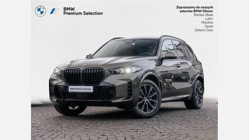 Brązowy manhattan metalizowany Używany 2025 BMW X5 Comfort Edition SUV | 419 900 zł - Obraz 1/3