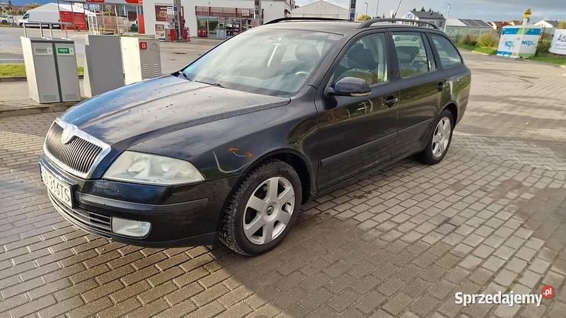 Czarny Używany 2005 Skoda Octavia Kombi | 11 900 zł (Uczciwa cena) - Obraz 1/4