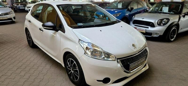 Biały Używany 2014 Peugeot 208 Hatchback | 20 900 zł (Uczciwa cena) - Obraz 1/3
