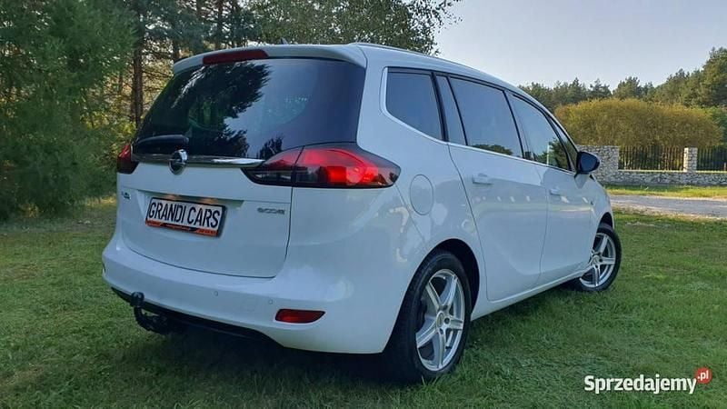 Biały Używany 2014 Opel Zafira Tourer Minivan | 27 999 zł - Obraz 1/4
