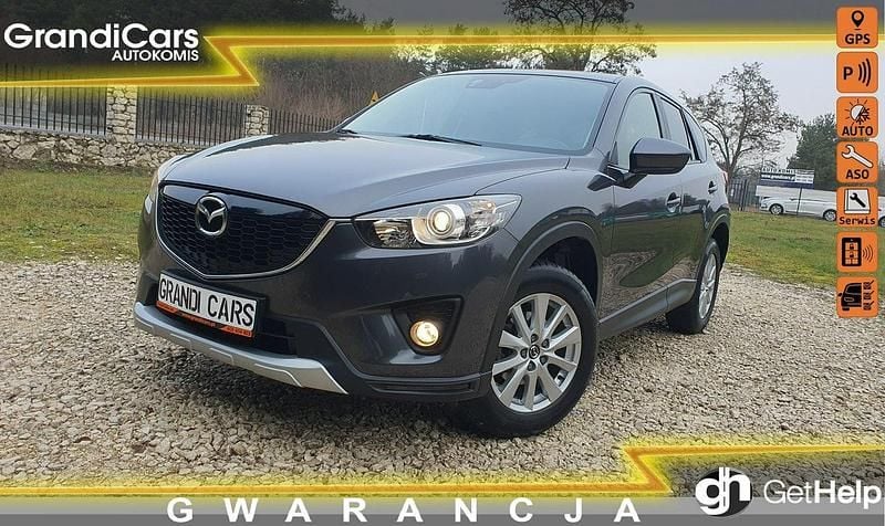 Szary Używany 2014 Mazda CX-5 SUV | 49 900 zł (Dobra cena) - Obraz 1/4