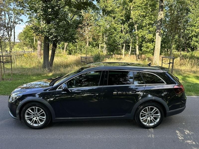 Używany Opel Insignia 163 KM (119 kW) 2014 Czarny (metalik, perła) Kombi