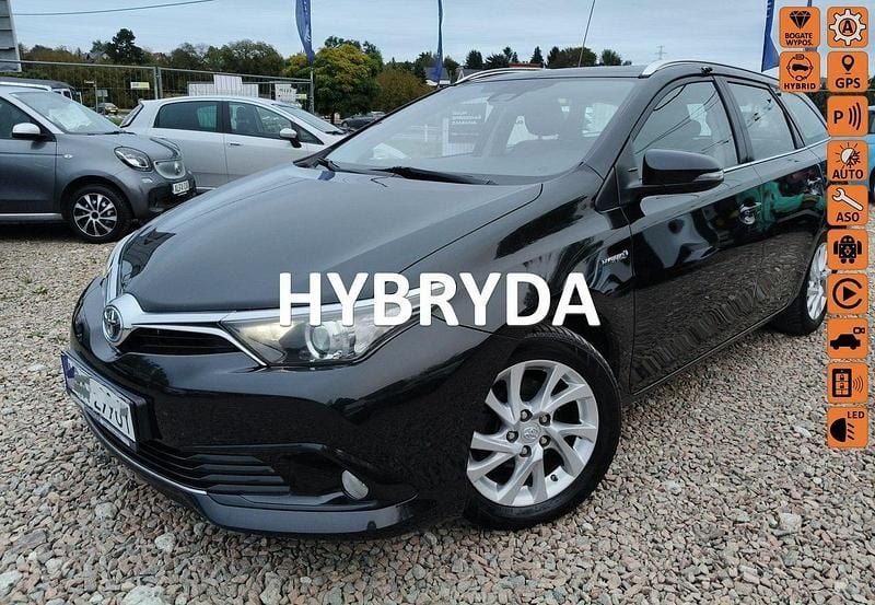 Czarny (metalik) Używany 2018 Toyota Auris Hybrid Kombi | 35 900 zł - Obraz 1/4