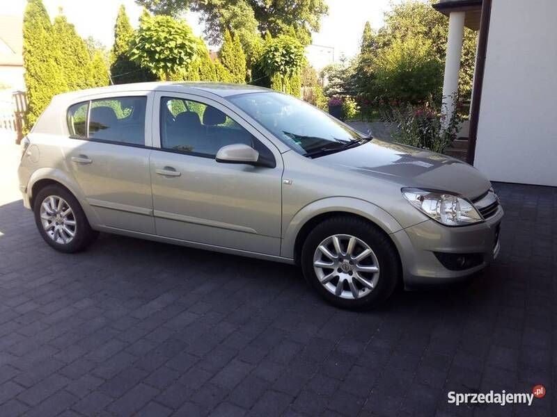 Złoty Używany 2007 Opel Astra Hatchback | 11 700 zł (Dobra cena) - Obraz 1/4