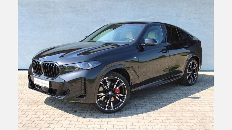 Czarny szafir metalizowany Używany 2024 BMW X6 Comfort Edition SUV | 459 900 zł - Obraz 1/3