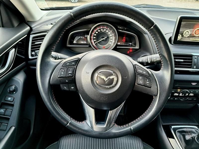 Używany Mazda 3 100 KM (73 kW) 2013 Czarny (metalik) Hatchback