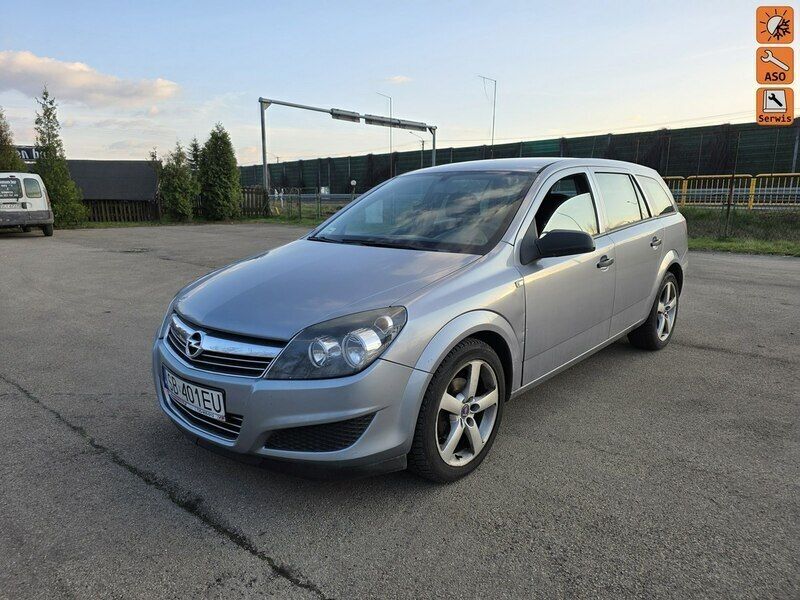 Szary (metalik, perła) Używany 2009 Opel Astra Kombi | 9900 zł (Uczciwa cena) - Obraz 1/4