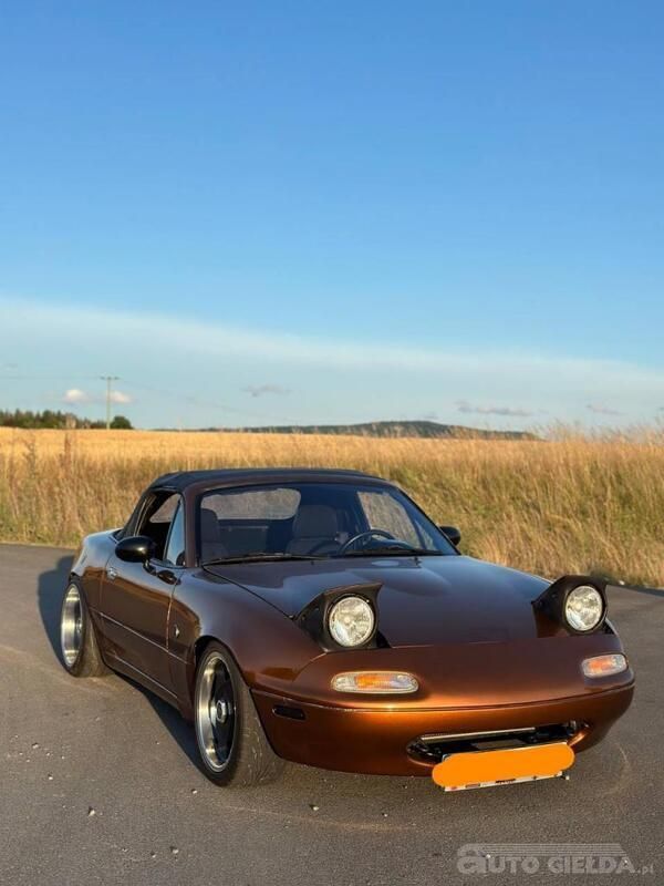 Pomaranczowy Używany 1997 Mazda MX5 Kabriolet | 31 900 zł - Obraz 1/4