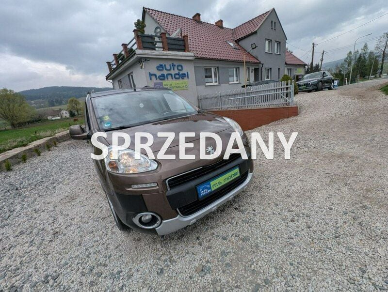 Brązowy (metalik) Używany 2013 Peugeot Partner Minivan | 26 900 zł (Uczciwa cena) - Obraz 1/4