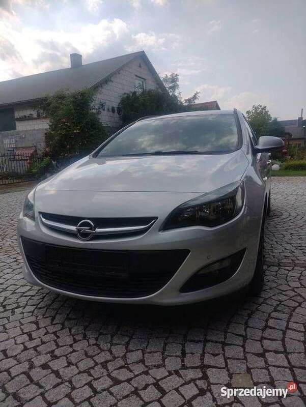 Srebrny Używany 2015 Opel Astra Kombi | 27 999 zł (Uczciwa cena) - Obraz 1/4