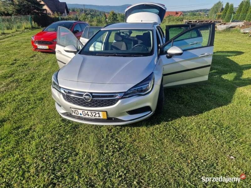 Srebrny Używany 2019 Opel Astra Kombi | 35 999 zł (Uczciwa cena) - Obraz 1/4