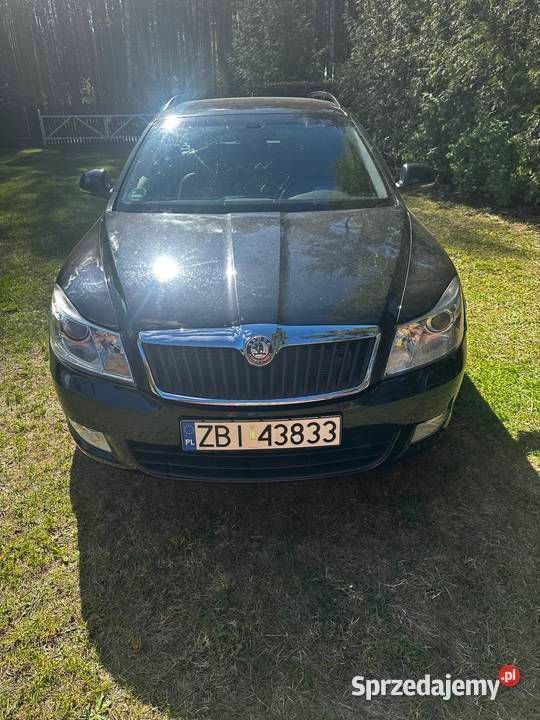 Czarny Używany 2010 Skoda Octavia Kombi | 25 900 zł (Uczciwa cena) - Obraz 1/4