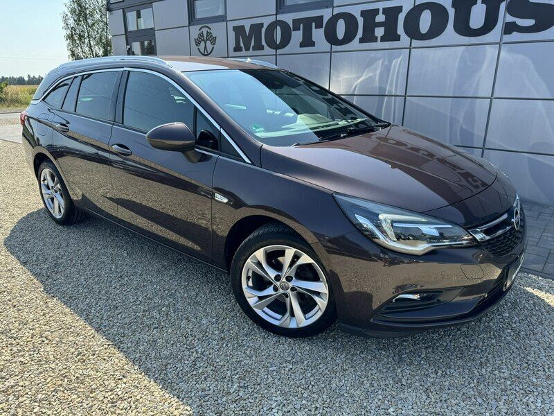 Brązowy (metalik) Używany 2016 Opel Astra Sedan/Limuzyna | 49 900 zł (Drogi) - Obraz 1/4