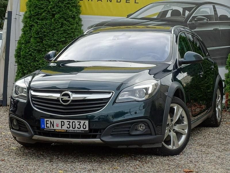 Zielony ciemny (metalik) Używany 2015 Opel Insignia Kombi | 35 900 zł (Uczciwa cena) - Obraz 1/4