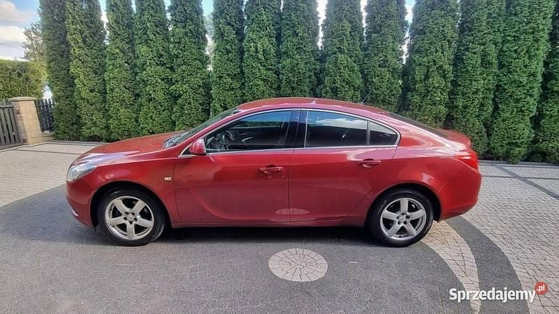 Używany Opel Insignia 130 KM (95 kW) 2009 Bordowy (metalik) Sedan/Limuzyna