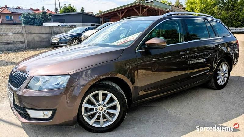 Szary (metalik) Używany 2017 Skoda Octavia Kombi | 37 900 zł - Obraz 1/4