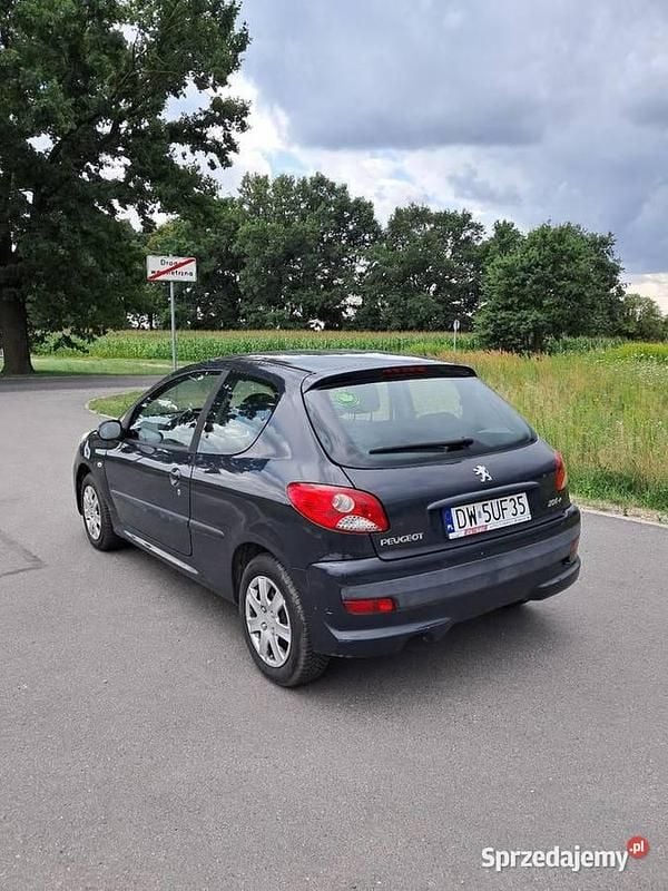 Zielony Używany 2009 Peugeot 206+ Hatchback | 7800 zł (Uczciwa cena) - Obraz 1/4