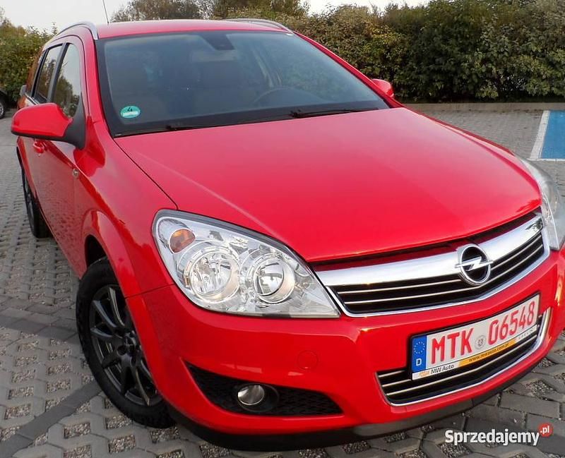 Czerwony Używany 2009 Opel Astra Kombi | 13 800 zł (Dość drogi) - Obraz 1/4