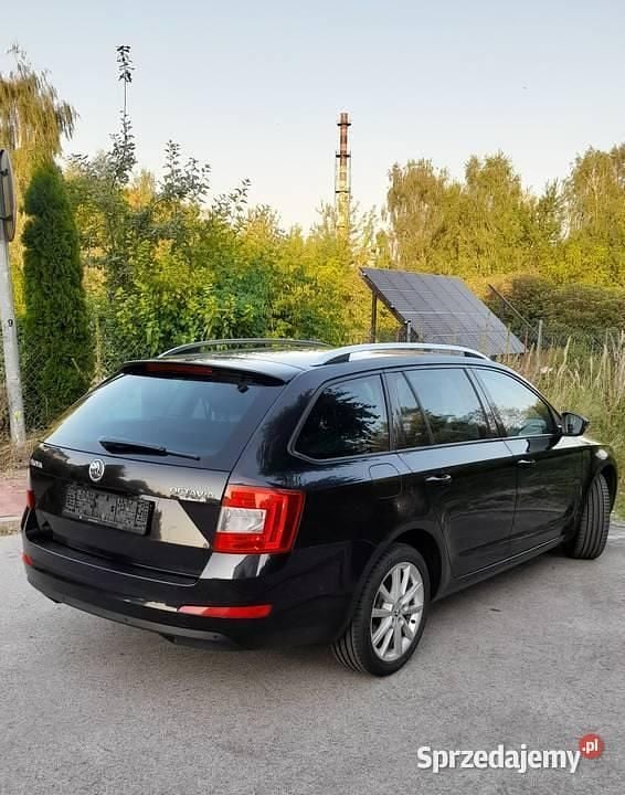 Czarny Używany 2014 Skoda Octavia Kombi | 35 900 zł (Uczciwa cena) - Obraz 1/4