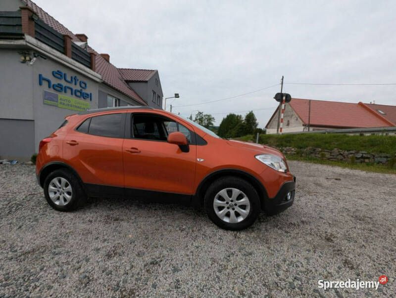 Pomarańczowy (metalik) Używany 2015 Opel Mokka SUV | 41 900 zł (Uczciwa cena) - Obraz 1/4