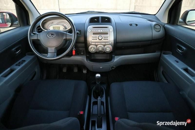 Czerwony (metalik, perła) Używany 2010 Subaru Justy Hatchback | 10 900 zł - Obraz 1/4