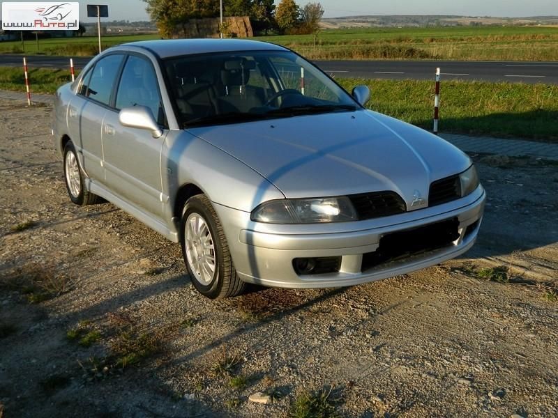 Używany Mitsubishi Carisma 181 KM (133 kW) 2003 Srebrny Sedan/Limuzyna