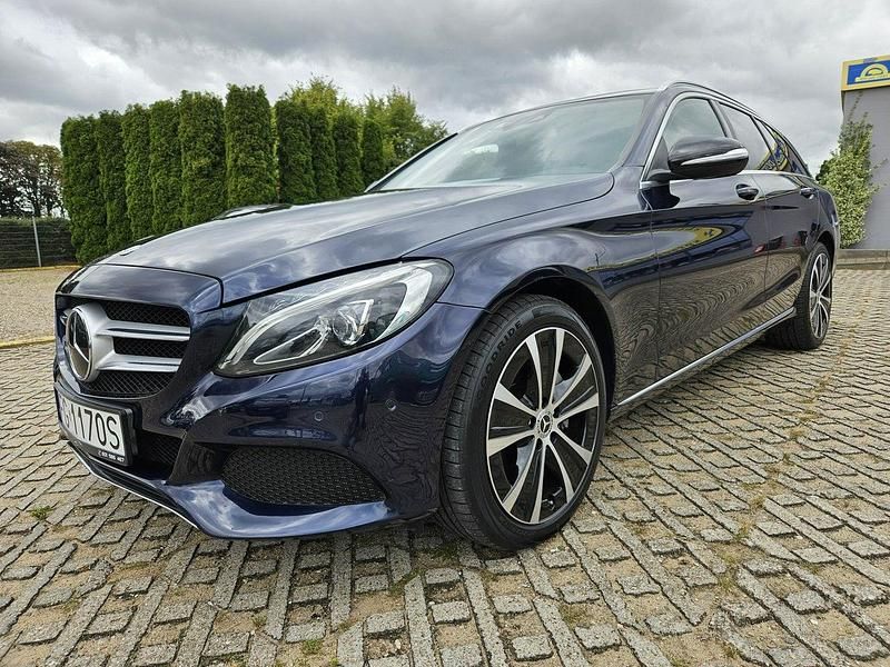 Niebieski ciemny (metalik) Używany 2016 Mercedes C250 Kombi | 68 900 zł - Obraz 1/4