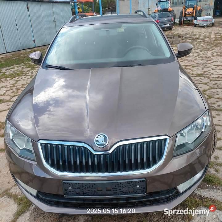 Brązowy Używany 2014 Skoda Octavia Kombi | 19 100 zł - Obraz 1/4