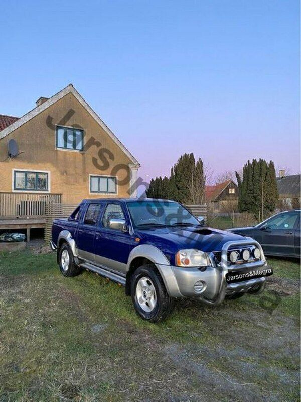 Niebieski Używany 2002 Nissan Navara Pickup | 22 100 zł - Obraz 1/2