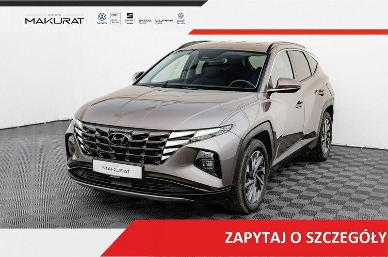 Beżowy Używany 2022 Hyundai Tucson SUV | 109 850 zł (Dobra cena) - Obraz 1/4