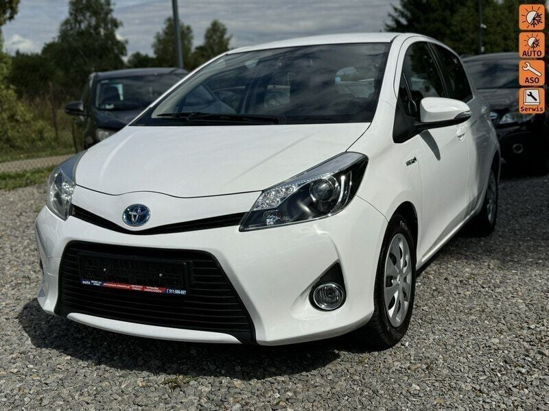 Biały Używany 2014 Toyota Yaris Hybrid Hatchback | 35 700 zł (Uczciwa cena) - Obraz 1/4