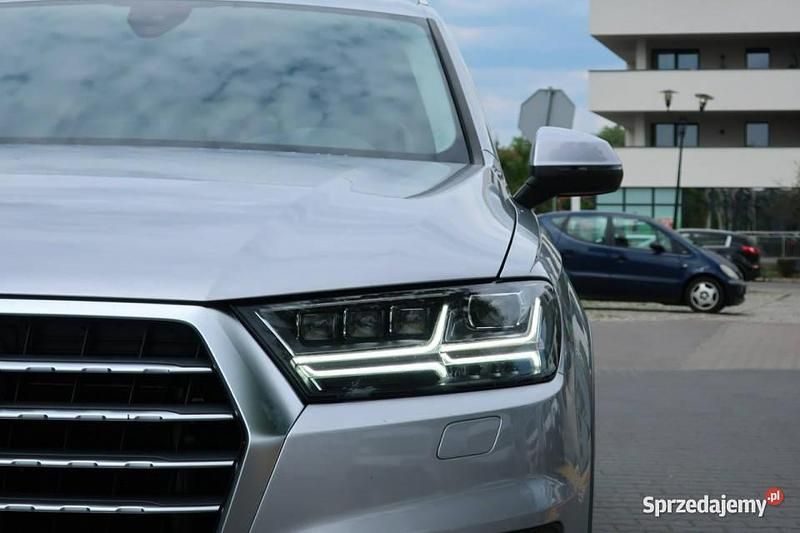 Srebrny (metalik) Używany 2018 Audi Q7 SUV | 169 900 zł (Uczciwa cena) - Obraz 1/4