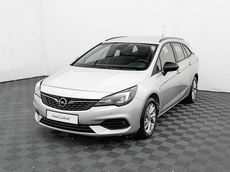 Używany Opel Astra Edition 130 KM (95 kW) 2021 Srebrny (metalik) Kombi