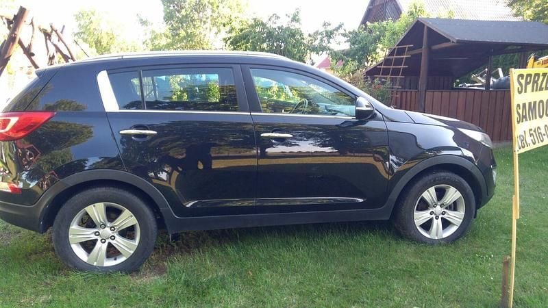 Czarny Używany 2011 Kia Sportage SUV | 34 999 zł (Uczciwa cena) - Obraz 1/4