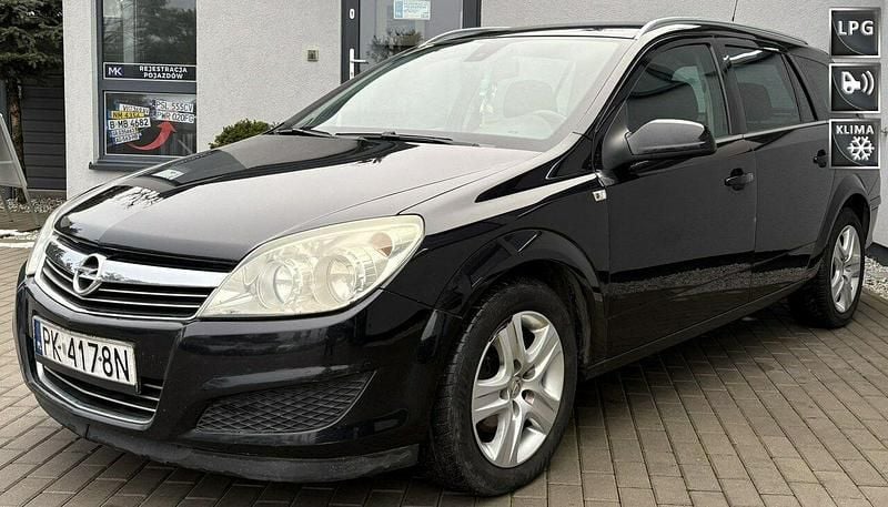 Czarny Używany 2009 Opel Astra Kombi | 11 500 zł (Uczciwa cena) - Obraz 1/4
