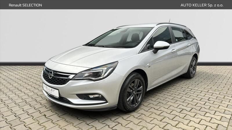 Srebrny (jasnoszary) Używany 2019 Opel Astra S Kombi | 68 900 zł - Obraz 1/4