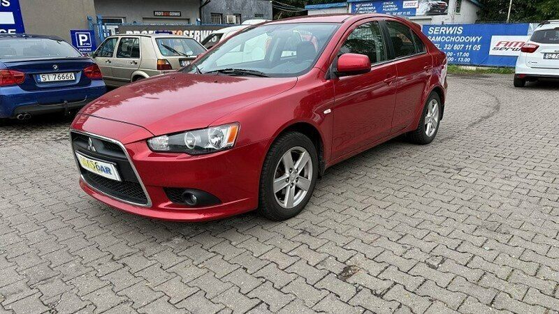 Bordowy Używany 2010 Mitsubishi Lancer Hatchback | 24 900 zł (Drogi) - Obraz 1/4