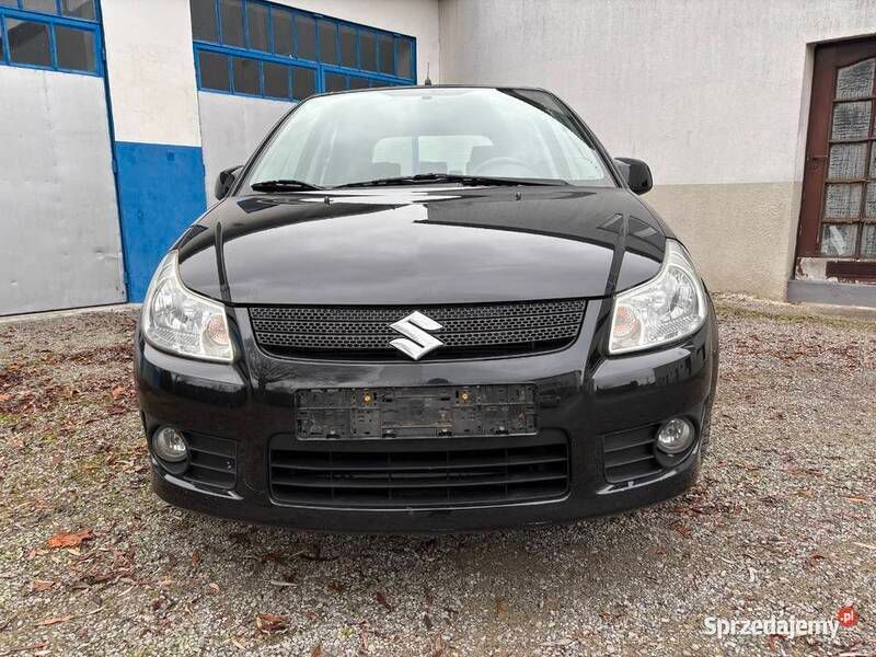 Czarny Używany 2007 Suzuki SX4 SUV | 15 900 zł (Uczciwa cena) - Obraz 1/4