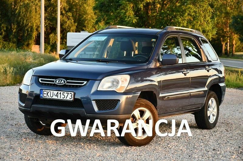 Niebieski ciemny (metalik, perła) Używany 2009 Kia Sportage SUV | 18 999 zł (Dobra cena) - Obraz 1/4