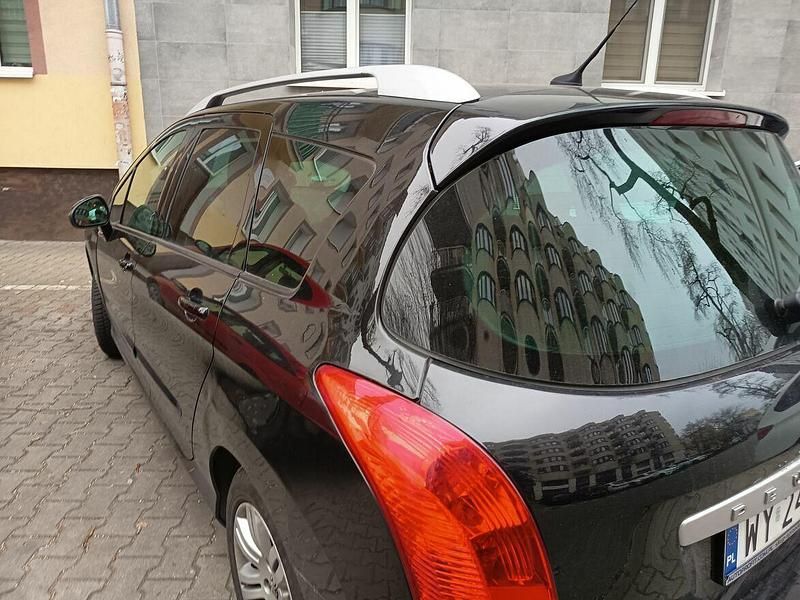 Używany Peugeot 308 SW 2010 Czerwony Kombi