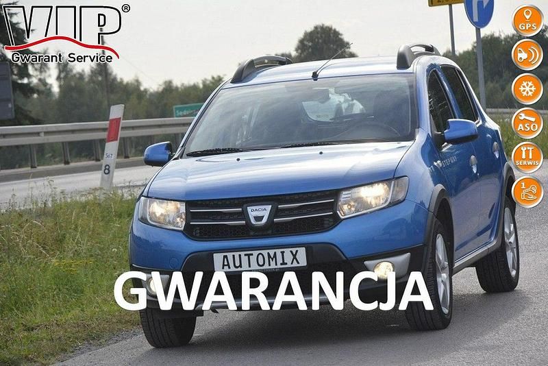 Niebieski Używany 2014 Dacia Sandero Stepway Hatchback | 25 600 zł - Obraz 1/4