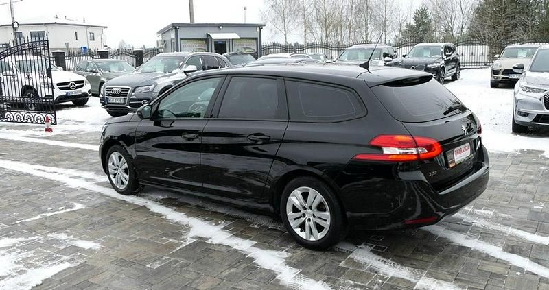 Używany Peugeot 308 SW 131 KM (96 kW) 2021 Czarny (metalik) Kombi
