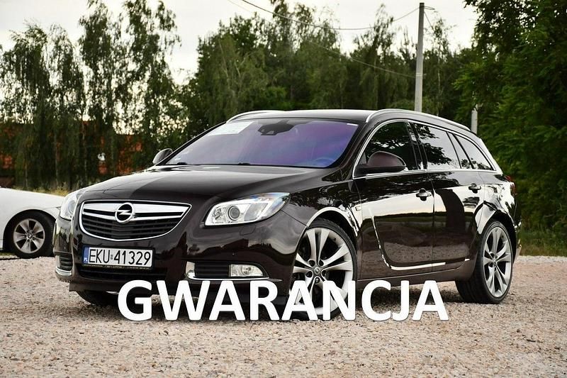 Brązowy (metalik, perła) Używany 2012 Opel Insignia Kombi | 26 999 zł (Uczciwa cena) - Obraz 1/4