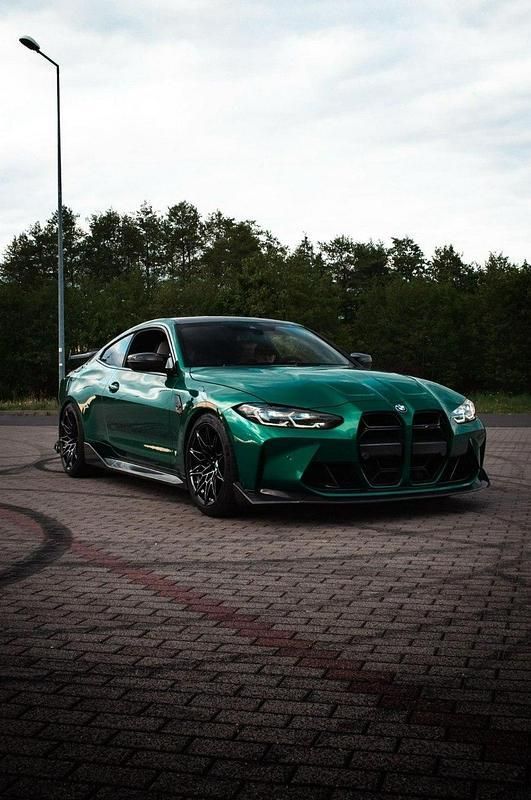 Zielony (metalik) Używany 2024 BMW M4 Coupe | 354 777 zł - Obraz 1/4