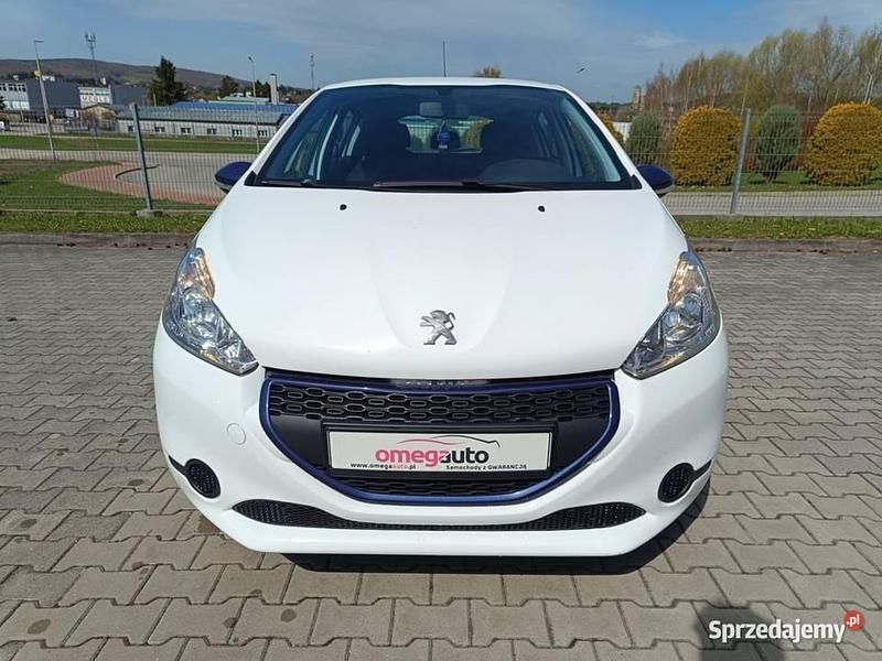 Biały Używany 2014 Peugeot 208 Hatchback | 23 000 zł (Uczciwa cena) - Obraz 1/4