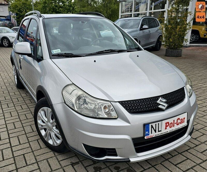Srebrny Używany 2012 Suzuki SX4 SUV | 27 900 zł - Obraz 1/4