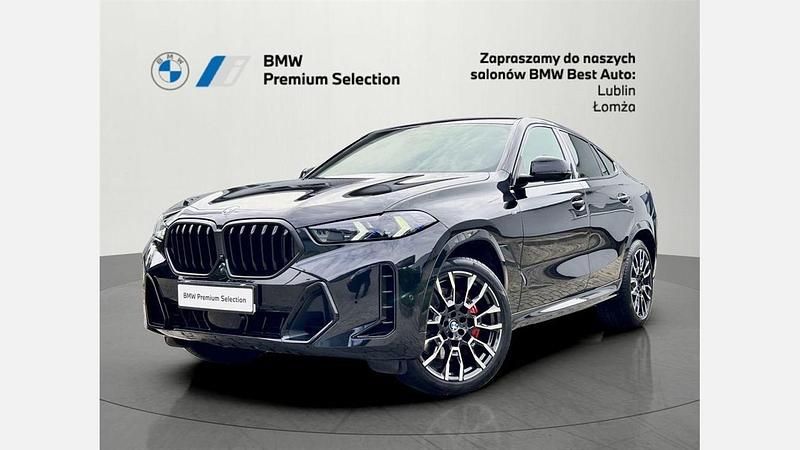 Czarny szafir metalizowany Używany 2024 BMW X6 Comfort Edition SUV | 424 900 zł - Obraz 1/3