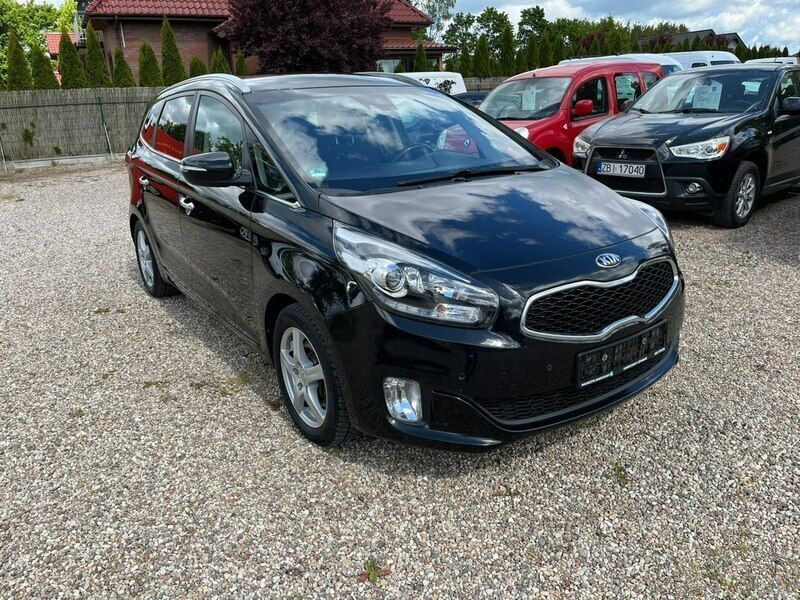 Używany Kia Carens 136 KM (100 kW) 2014 Czarny (metalik) Minivan